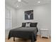 Cozy bedroom with a comfortable bed, a nightstand, and a serene atmosphere at 630 Brashy St, Woodstock, GA 30188