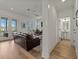 Comfortable living room featuring French doors leading to the outdoor area and hardwood floors at 630 Brashy St, Woodstock, GA 30188