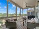 Relaxing screened porch offers comfortable seating and scenic views at 630 Brashy St, Woodstock, GA 30188
