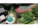 A tranquil pool and tennis court complement outdoor living in this beautiful property at 1024 Lake Charles Dr, Roswell, GA 30075