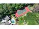Property featuring a pool, tennis court, landscaped grounds, and well-maintained backyard at 1024 Lake Charles Dr, Roswell, GA 30075