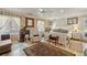 Bright bedroom with patterned wallpaper, natural light, white furniture, and an area rug at 1024 Lake Charles Dr, Roswell, GA 30075