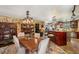 An eclectic dining room featuring vintage cabinets, an island with bar seating, and unique lighting fixtures at 1024 Lake Charles Dr, Roswell, GA 30075