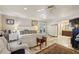 Bright main bedroom boasts tiled floors, ceiling fan, and adjoining bathroom at 1024 Lake Charles Dr, Roswell, GA 30075