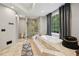 A modern bathroom showcases a walk-in glass shower, soaking tub, and neutral tile flooring at 105 Postwood Dr, Fayetteville, GA 30215