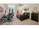 Bedroom with black furniture, neutral paint, carpet, and natural light at 105 Postwood Dr, Fayetteville, GA 30215