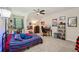 Comfortable bedroom featuring vaulted ceilings, carpet, and a ceiling fan at 105 Postwood Dr, Fayetteville, GA 30215