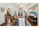 Inviting living room with hardwood floors, and neutral tones provides a comfortable setting at 105 Postwood Dr, Fayetteville, GA 30215