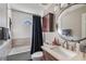 Cozy bathroom featuring a tub/shower combination and a modern sink with updated fixtures at 1270 Taylor Oaks Dr, Roswell, GA 30076