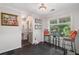 Bright breakfast nook with wainscoting, a large window and seating for two, perfect for casual dining at 1270 Taylor Oaks Dr, Roswell, GA 30076