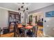 Dining room with hardwood floors and an adjacent living area at 1270 Taylor Oaks Dr, Roswell, GA 30076