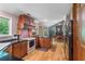 Open kitchen with granite countertops, gas cooktop, and direct access to the breakfast and living areas at 1270 Taylor Oaks Dr, Roswell, GA 30076