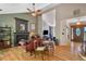 Inviting living room featuring hardwood floors, a fireplace, and a cozy seating area at 1270 Taylor Oaks Dr, Roswell, GA 30076