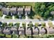 Aerial view of the neighborhood showing houses with manicured lawns at 2600 Arnold Palmer Way, Duluth, GA 30096