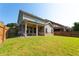 Exterior view of house, backyard, and patio at 2600 Arnold Palmer Way, Duluth, GA 30096