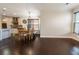 Bright dining area with hardwood floors is conveniently located near the kitchen at 2600 Arnold Palmer Way, Duluth, GA 30096