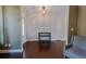 Sitting area with beautiful hard wood floors and modern furnishings near entry door at 2600 Arnold Palmer Way, Duluth, GA 30096