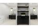 Elegant bathroom with and sinks, dark cabinets, and contemporary décor at 5455 Malone Ct, Powder Springs, GA 30127