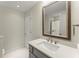This bathroom features a large mirror and updated vanity at 5455 Malone Ct, Powder Springs, GA 30127