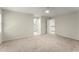 This bedroom has neutral walls, plush carpet and a ceiling fan at 5455 Malone Ct, Powder Springs, GA 30127