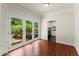 Bonus room featuring double doors to the backyard and access to the laundry room at 5455 Malone Ct, Powder Springs, GA 30127