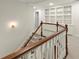 Staircase with carpeted steps, and a built-in bookcase at 5455 Malone Ct, Powder Springs, GA 30127