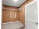 This walk-in closet features sturdy wire shelving and wood-like paneling at 5455 Malone Ct, Powder Springs, GA 30127
