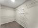 A well-organized walk-in closet with plenty of shelving at 5455 Malone Ct, Powder Springs, GA 30127