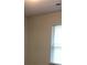 A bedroom with a window with blinds at 5671 Radford Loop, Fairburn, GA 30213
