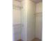 Large walk-in closet with ample shelving for optimal organization and storage solutions at 5671 Radford Loop, Fairburn, GA 30213