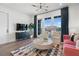 Inviting living room with a modern aesthetic, natural light, and comfortable seating at 989 Bibbs Circle # 25, Atlanta, GA 30318