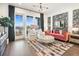 Elegant living room featuring floor-to-ceiling windows, stylish decor and hardwood floors at 989 Bibbs Circle # 25, Atlanta, GA 30318