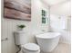 Bathroom featuring stylish soaking tub and modern fixtures at 2015 Clipper Straits, Snellville, GA 30078