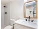 Bathroom with stand up shower that is tiled and includes matte black shower head and hardware at 2015 Clipper Straits, Snellville, GA 30078