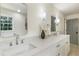 Bright bathroom features double vanity and a modern aesthetic at 2015 Clipper Straits, Snellville, GA 30078