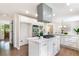 Eat-in kitchen featuring stainless steel appliances, granite countertops, and center island cooktop at 2015 Clipper Straits, Snellville, GA 30078