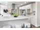 Bright kitchen featuring a quartz countertop island with seating at 2015 Clipper Straits, Snellville, GA 30078