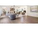 Spacious living room featuring hardwood floors, ample seating, fireplace, and stylish decor at 2015 Clipper Straits, Snellville, GA 30078