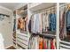 Walk-in closet with custom shelves, hanging racks, and built-in storage solutions at 2617 Warwick Ne Cir, Atlanta, GA 30345