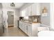Bright kitchen featuring granite counters, a tile backsplash, and stainless steel appliances at 2617 Warwick Ne Cir, Atlanta, GA 30345