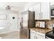 Renovated kitchen with stainless steel appliances, a breakfast nook, and ample storage at 2617 Warwick Ne Cir, Atlanta, GA 30345