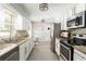 Updated kitchen with stainless steel appliances, granite countertops, and ample cabinet space at 2617 Warwick Ne Cir, Atlanta, GA 30345