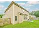 Fully fenced backyard with a well-maintained lawn and patio area, perfect for outdoor enjoyment at 3869 Maiden Fern Ln, Snellville, GA 30039