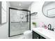 Contemporary bathroom with a sleek glass shower and a vanity featuring modern fixtures at 3869 Maiden Fern Ln, Snellville, GA 30039