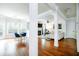 Open-concept living spaces featuring hardwood floors, a fireplace, and ample natural light, great for entertaining at 3869 Maiden Fern Ln, Snellville, GA 30039