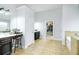 Large primary bathroom with dual vanities, a soaking tub, and a walk-in closet at 3869 Maiden Fern Ln, Snellville, GA 30039