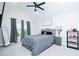 Inviting main bedroom featuring a vaulted ceiling, gray accents, and great natural light at 3869 Maiden Fern Ln, Snellville, GA 30039