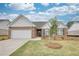 Charming single-story home with brick facade, attached garage, and well-manicured lawn at 670 Park Place Way, Social Circle, GA 30025