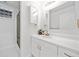 Modern bathroom with an enclosed shower and a sleek vanity with a framed mirror at 1575 Wynridge Pointe, Alpharetta, GA 30005