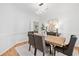 Elegant dining room with modern light fixture and stylish decor at 1575 Wynridge Pointe, Alpharetta, GA 30005